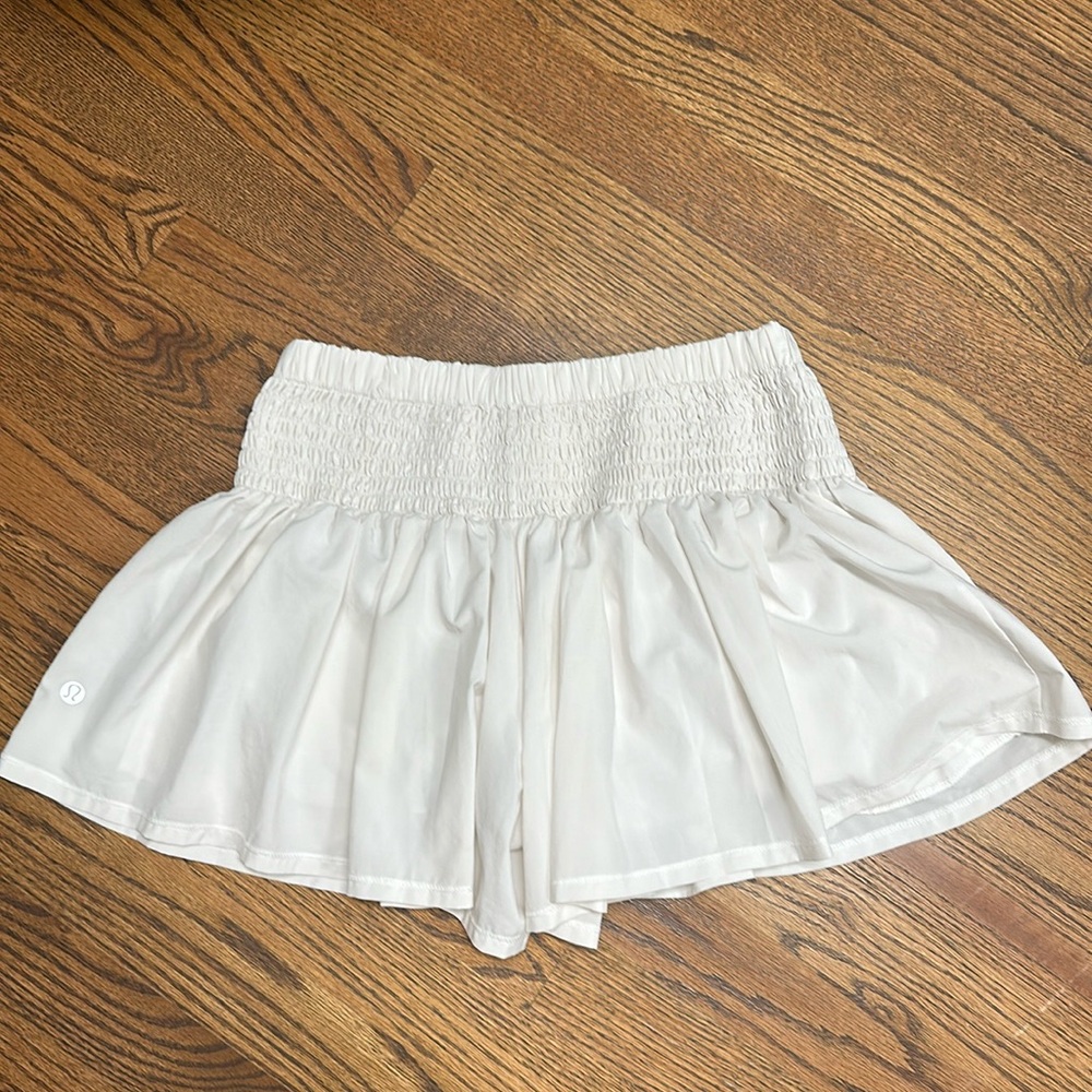 Lululemon flouncy shorts. Silicone biker shorts underneath like the skirts